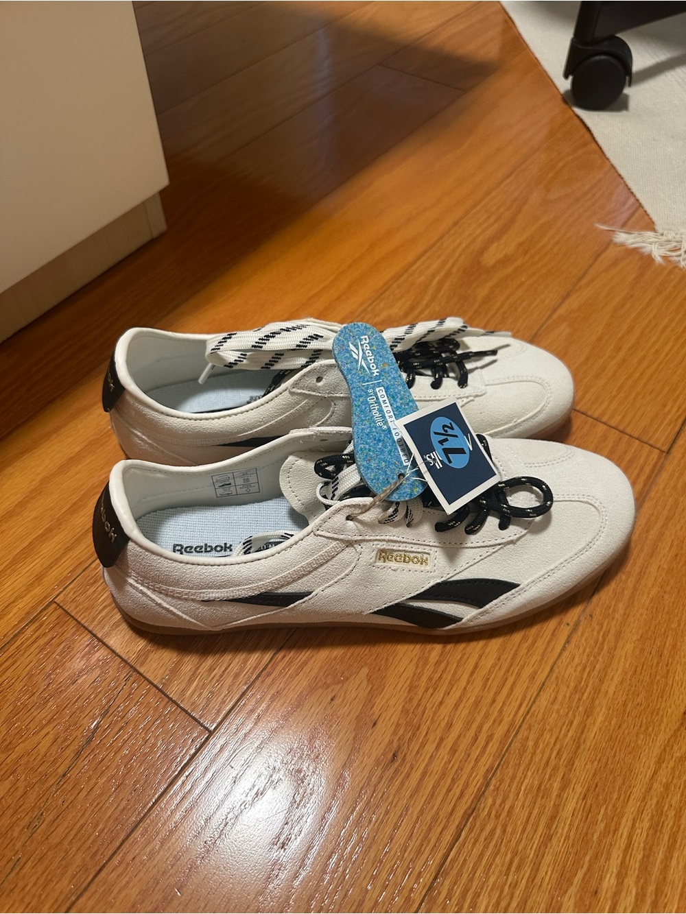 Reebok White Canvas Sneakers with Black Accents